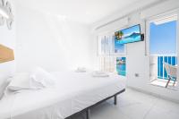 Postel nebo postele na pokoji v ubytování Veracruz 17-B Deluxe Apartament Levante Beach