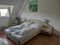 Łóżko lub łóżka w pokoju w obiekcie Hotel Familia