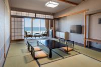 ホテル三楽荘にあるテレビまたはエンターテインメントセンター