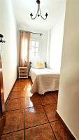 Postel nebo postele na pokoji v ubytování La Casita Nueva