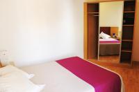 Posteľ alebo postele v izbe v ubytovaní Hotel Amic Colon