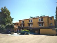 a hotel with a sign on the front of it at Cit&#39;Hotel Hotel Prime - A709 in Saint-Jean-de-Védas