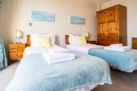 Postel nebo postele na pokoji v ubytování 2-bedroom Apartment - Fistral Beach