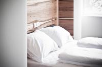 A bed or beds in a room at Hotel Daniel Vienna - Smart Lifestyle Near City Centre