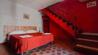 Posteľ alebo postele v izbe v ubytovaní Traditional sicilian home