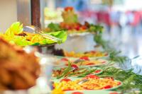 a buffet of plates of food on a table at Pine House by Werde Hotels in Kemer