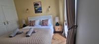 Cama ou camas em um quarto em Cannes Meynadier: Superbe appartement trois pi&egrave;ces