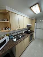 Kuchyň nebo kuchyňský kout v ubytování Apartamento caribe