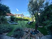 Vonkajšia záhrada v ubytovaní Apartment Urban Oasis