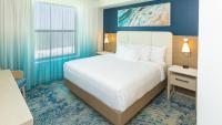 Ein Bett oder Betten in einem Zimmer der Unterkunft Holiday Inn Club Vacations Myrtle Beach Oceanfront