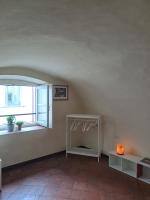 A bed or beds in a room at Casa di Via Porta Dipinta