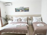 Posteľ alebo postele v izbe v ubytovaní Apartments Irma