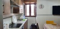 A kitchen or kitchenette at La Casina de Marina de Tresgrandas