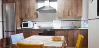A kitchen or kitchenette at La Casina de Marina de Tresgrandas