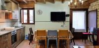 A kitchen or kitchenette at La Casina de Marina de Tresgrandas