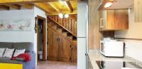 A kitchen or kitchenette at La Casina de Marina de Tresgrandas
