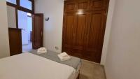 Postel nebo postele na pokoji v ubytování Sunny Beach Aloha Apartment