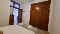 Postel nebo postele na pokoji v ubytování Sunny Beach Aloha Apartment