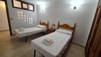 Postel nebo postele na pokoji v ubytování Sunny Beach Aloha Apartment