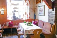 a dining room with a table and chairs at Hotel Brauereigasthof Schwanenbräu in Ebermannstadt