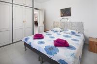 Postel nebo postele na pokoji v ubytování Villa Mimosa