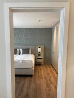 Postel nebo postele na pokoji v ubytování CITY STAY - Kieselgasse