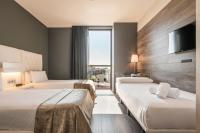 Postel nebo postele na pokoji v ubytování Hotel SB Plaza Europa