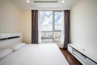 Vinhomes Residences Luxury Suiteにあるベッド