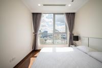 Vinhomes Residences Luxury Suiteにあるベッド