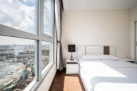 Vinhomes Residences Luxury Suiteにあるベッド