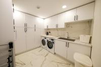 A kitchen or kitchenette at Olive Hills Villa - Family-Friendly Luxury Villa Yesiluzumlu Fethiye by Sunworld Villas