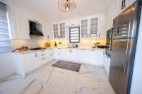 A kitchen or kitchenette at Olive Hills Villa - Family-Friendly Luxury Villa Yesiluzumlu Fethiye by Sunworld Villas