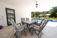 The swimming pool at or close to Olive Hills Villa - Family-Friendly Luxury Villa Yesiluzumlu Fethiye by Sunworld Villas
