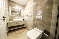 A bathroom at Olive Hills Villa - Family-Friendly Luxury Villa Yesiluzumlu Fethiye by Sunworld Villas