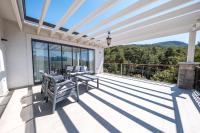 A balcony or terrace at Olive Hills Villa - Family-Friendly Luxury Villa Yesiluzumlu Fethiye by Sunworld Villas