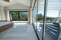 A balcony or terrace at Olive Hills Villa - Family-Friendly Luxury Villa Yesiluzumlu Fethiye by Sunworld Villas