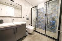 A bathroom at Olive Hills Villa - Family-Friendly Luxury Villa Yesiluzumlu Fethiye by Sunworld Villas
