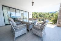A seating area at Olive Hills Villa - Family-Friendly Luxury Villa Yesiluzumlu Fethiye by Sunworld Villas