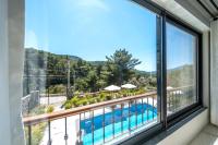 The swimming pool at or close to Olive Hills Villa - Family-Friendly Luxury Villa Yesiluzumlu Fethiye by Sunworld Villas