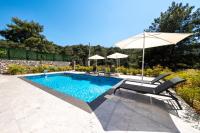The swimming pool at or close to Olive Hills Villa - Family-Friendly Luxury Villa Yesiluzumlu Fethiye by Sunworld Villas
