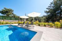 The swimming pool at or close to Olive Hills Villa - Family-Friendly Luxury Villa Yesiluzumlu Fethiye by Sunworld Villas