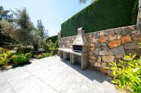 A garden outside Olive Hills Villa - Family-Friendly Luxury Villa Yesiluzumlu Fethiye by Sunworld Villas