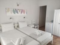 Posteľ alebo postele v izbe v ubytovaní Vetti Rooms