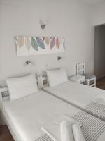 Posteľ alebo postele v izbe v ubytovaní Vetti Rooms
