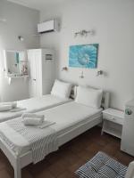 Posteľ alebo postele v izbe v ubytovaní Vetti Rooms