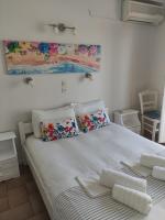 Posteľ alebo postele v izbe v ubytovaní Vetti Rooms
