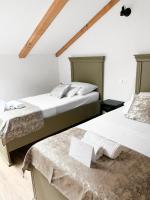 Postel nebo postele na pokoji v ubytování Centrum Luxury Rooms