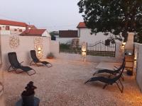 Patio alebo iná vonkajšia časť ubytovania Nino