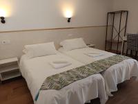 SG ROOMSにあるベッド