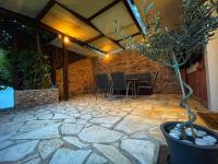 A patio or other outdoor area at Glyfada Beach House